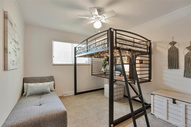 8262 Otis Ct, Arvada, CO 80003 - carpeted bedroom featuring ornamental molding and a ceiling fan