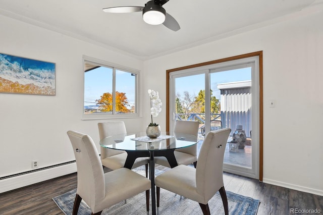 295 E Amherst Ave, Englewood, CO 80113 - dining room featuring a baseboard radiator, wood finished floors, a ceiling fan, and baseboards