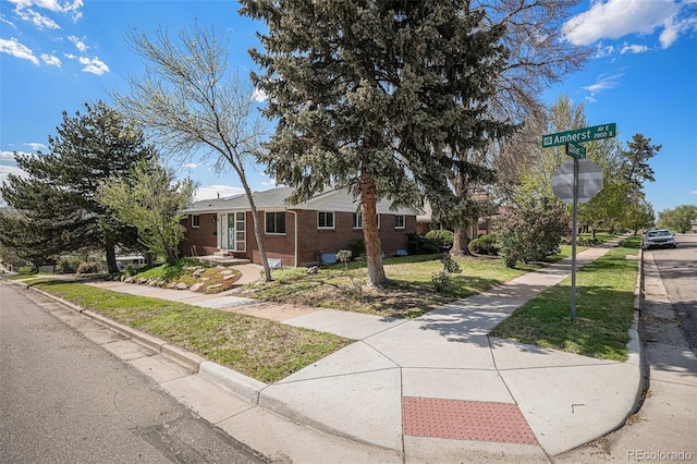 295 E Amherst Ave, Englewood, CO 80113 - ranch-style house featuring brick siding and a front lawn