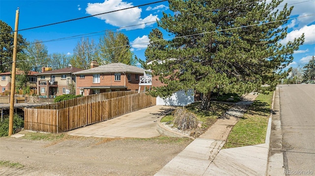 295 E Amherst Ave, Englewood, CO 80113 - view of front of property with driveway, fence, and a garage