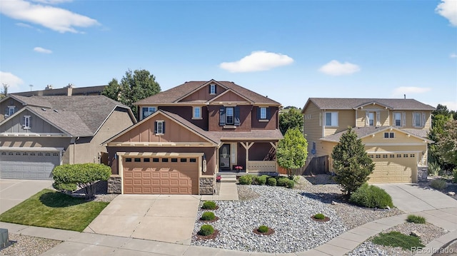 6723 Silverwind Cir, Colorado Springs, CO 80923 - craftsman house featuring board and batten siding, driveway, stone siding, and a residential view