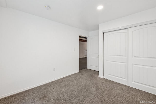 6723 Silverwind Cir, Colorado Springs, CO 80923 - unfurnished bedroom with carpet flooring, a closet, and recessed lighting