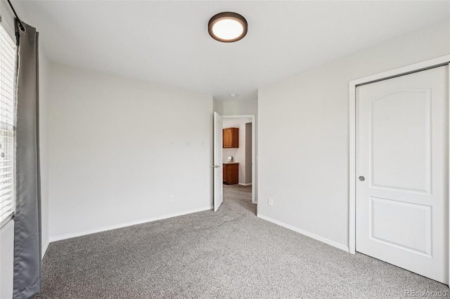 6723 Silverwind Cir, Colorado Springs, CO 80923 - unfurnished bedroom with carpet and baseboards