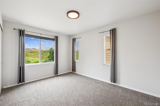 6723 Silverwind Cir, Colorado Springs, CO 80923 - carpeted spare room featuring baseboards