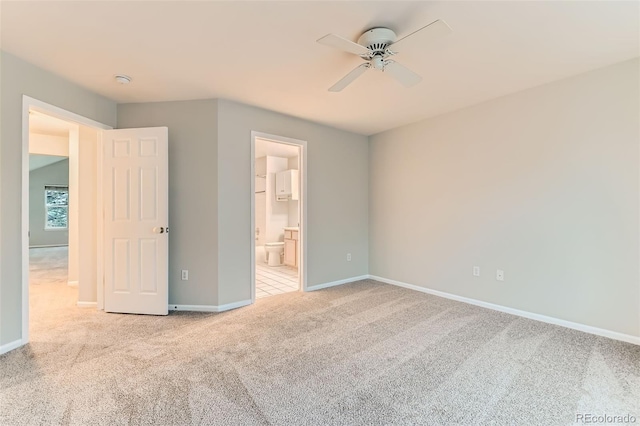 1121 W 112th Ave Unit C, Denver, CO 80234 - unfurnished bedroom with carpet floors, connected bathroom, and ceiling fan