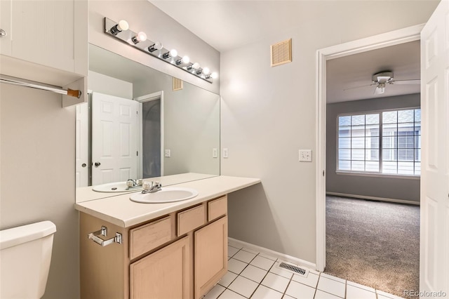 1121 W 112th Ave Unit C, Denver, CO 80234 - bathroom with vanity, tile patterned flooring, and ceiling fan