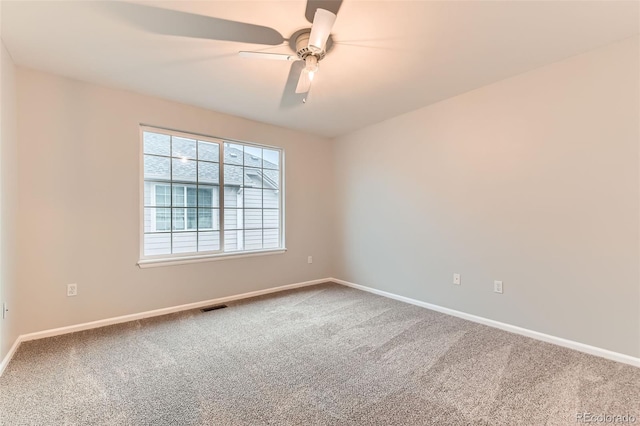 1121 W 112th Ave Unit C, Denver, CO 80234 - spare room featuring carpet floors and ceiling fan