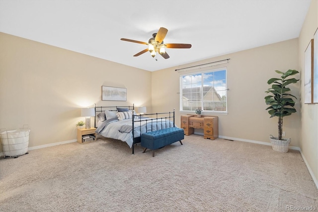 25811 E Archer Ave, Aurora, CO 80018 - bedroom with carpet floors, baseboards, and a ceiling fan