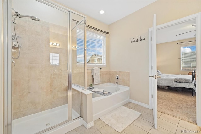 25811 E Archer Ave, Aurora, CO 80018 - ensuite bathroom with tile patterned flooring, a shower stall, and plenty of natural light
