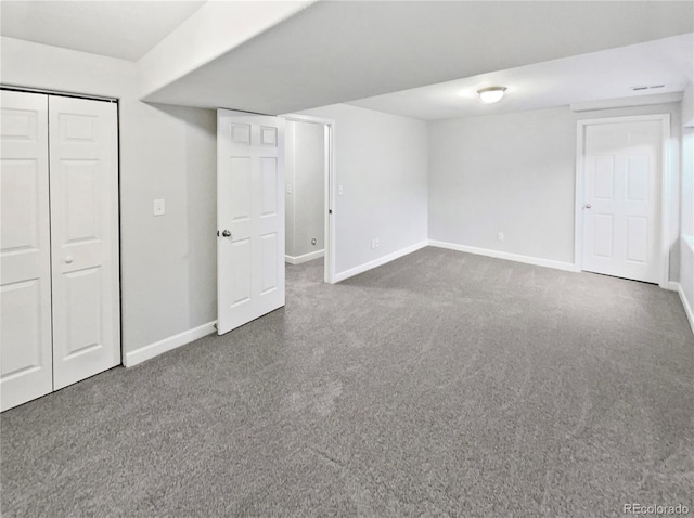 unfurnished bedroom with carpet, a closet, visible vents, and baseboards