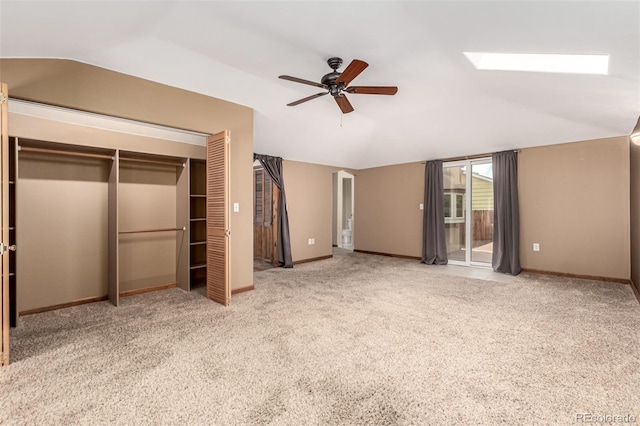 1060 S Eaton St, Lakewood, CO 80226 - unfurnished bedroom with a skylight, lofted ceiling, access to outside, carpet floors, and a closet