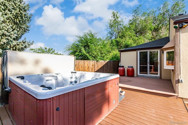 1060 S Eaton St, Lakewood, CO 80226 - wooden terrace with a hot tub
