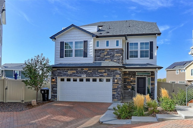 view of front of property featuring a garage