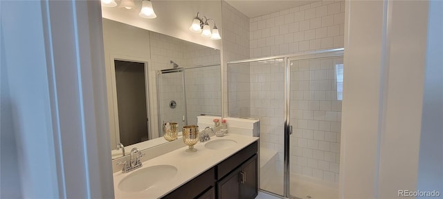 9279 Merino Ct Unit B, Littleton, CO 80125 - bathroom with a stall shower and double vanity