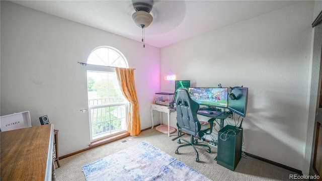 9832 N Crystal Lake Dr, Littleton, CO 80125 - home office featuring a ceiling fan, carpet flooring, and baseboards