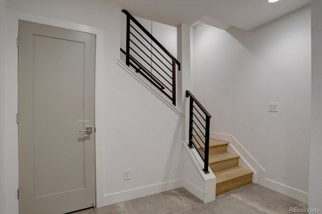 staircase with baseboards