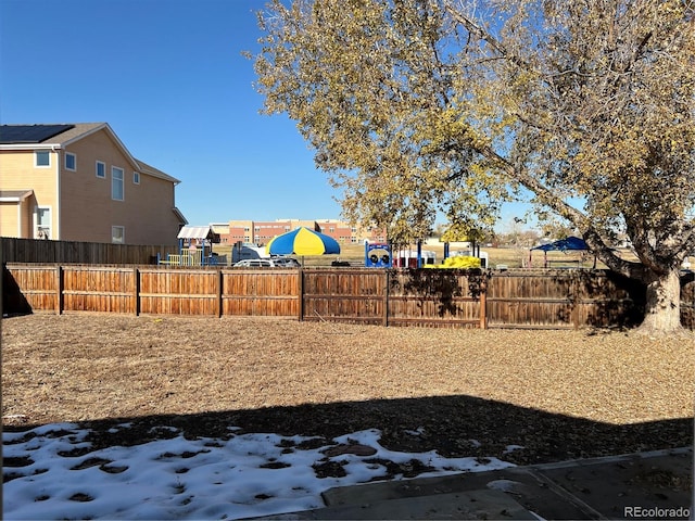 view of yard covered in snow