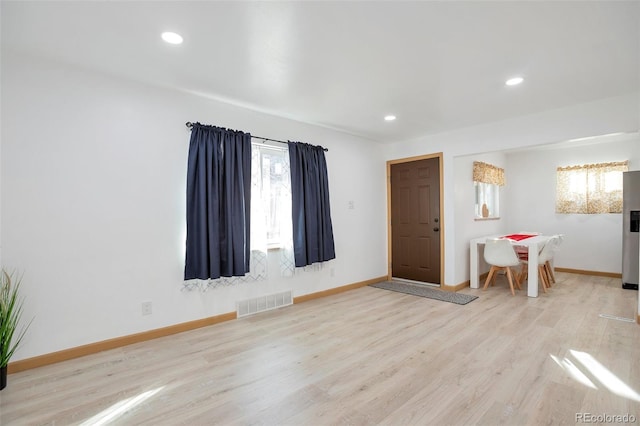 interior space with light hardwood / wood-style floors