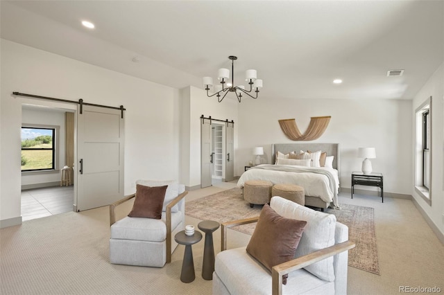 carpeted bedroom featuring lofted ceiling, a barn door, and a notable chandelier