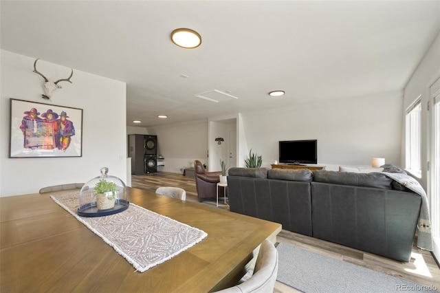 dining space featuring light wood-type flooring