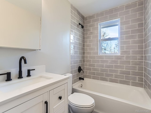 bathroom with vanity, toilet, and shower / bathtub combination