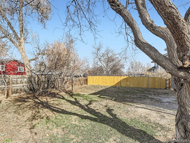 view of yard featuring fence