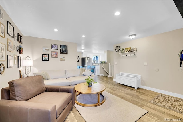 3561 W 131st Ave, Broomfield, CO 80020 - living area with baseboards, light wood-style floors, and recessed lighting