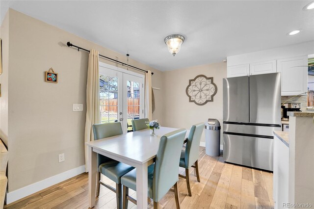 3561 W 131st Ave, Broomfield, CO 80020 - dining space featuring light wood-type flooring, baseboards, french doors, and recessed lighting