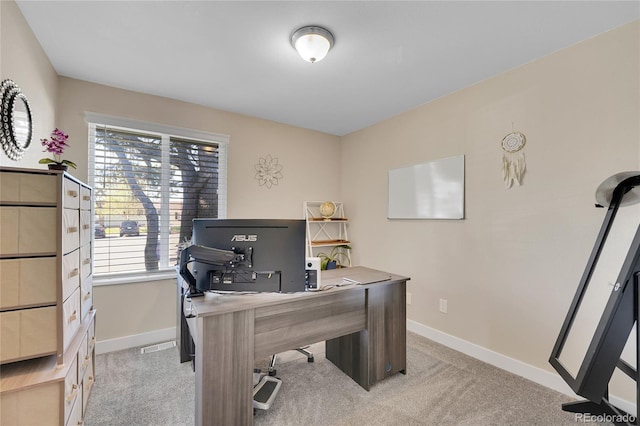 3561 W 131st Ave, Broomfield, CO 80020 - home office with healthy amount of natural light, baseboards, and light carpet
