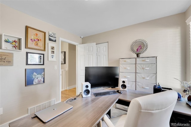 3561 W 131st Ave, Broomfield, CO 80020 - office area featuring baseboards and wood finished floors