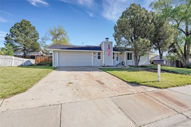 3561 W 131st Ave, Broomfield, CO 80020 - view of front facade with concrete driveway, an attached garage, and a chimney