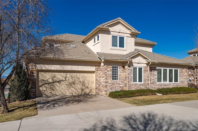 traditional-style house featuring stucco siding, stone siding, concrete driveway, and a tiled roof