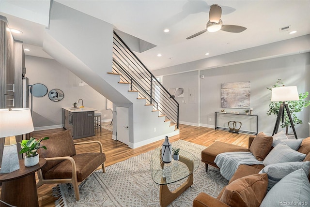 4144 Tennyson St Unit 212, Denver, CO 80212 - living area with stairway, light wood-style floors, a ceiling fan, baseboards, and recessed lighting