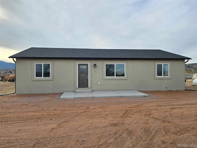 rear view of property with a patio