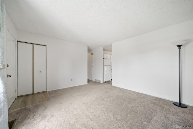 10007 Bryant St, Denver, CO 80260 - carpeted spare room with a textured ceiling