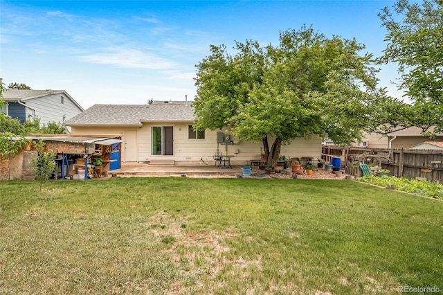10007 Bryant St, Denver, CO 80260 - rear view of house featuring a patio area and a shingled roof