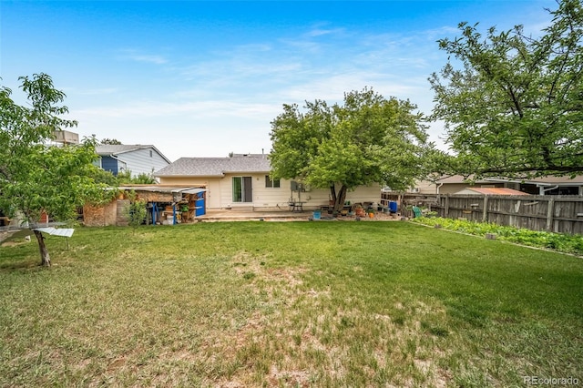 10007 Bryant St, Denver, CO 80260 - rear view of property with a patio