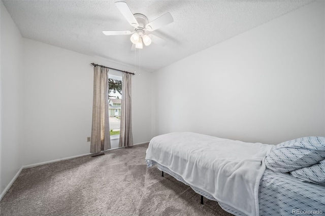 10007 Bryant St, Denver, CO 80260 - bedroom featuring a textured ceiling, carpet floors, baseboards, and a ceiling fan