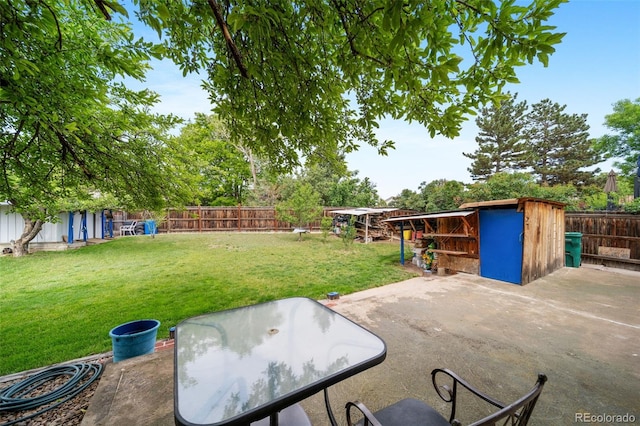 10007 Bryant St, Denver, CO 80260 - view of patio / terrace featuring an outbuilding