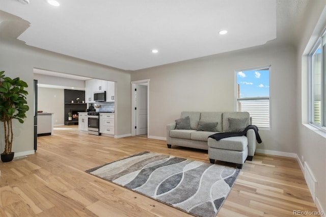 living room featuring light wood-type flooring