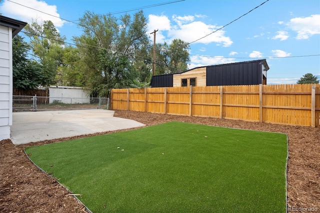 view of yard with a patio area