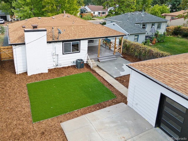 exterior space with cooling unit and a patio