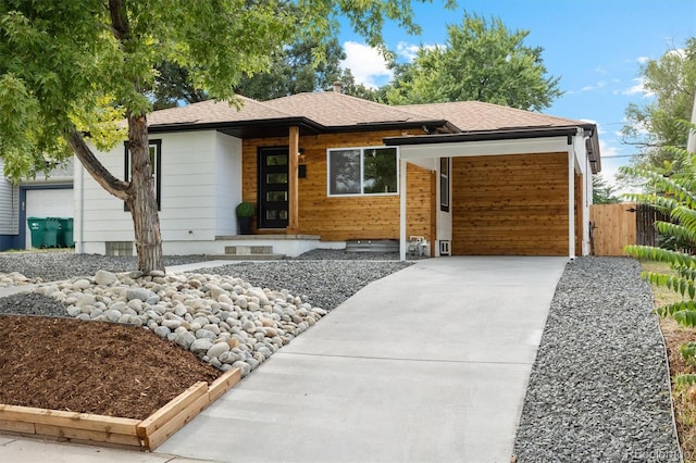 view of front of house with a carport