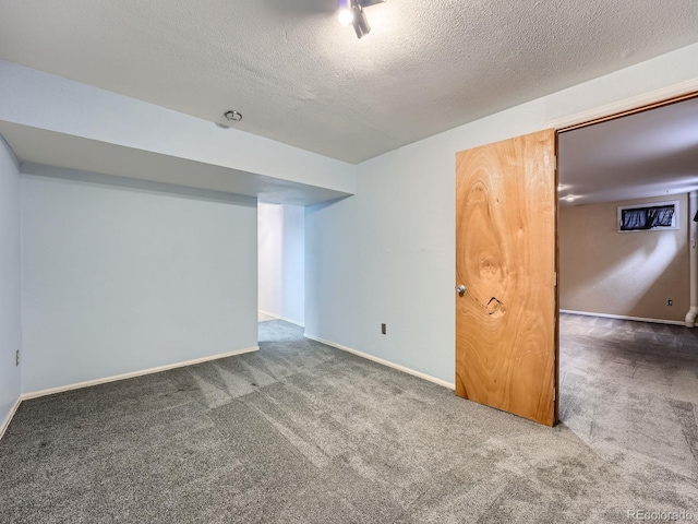 4032 S Atchison Way, Aurora, CO 80014 - carpeted spare room featuring a textured ceiling and baseboards