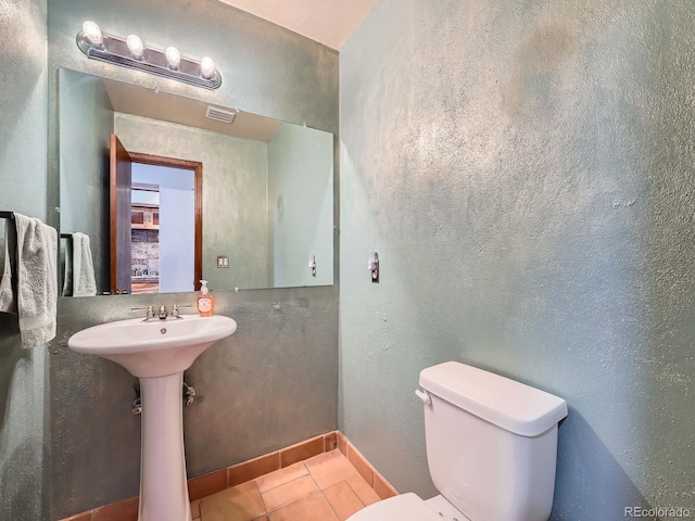 4032 S Atchison Way, Aurora, CO 80014 - bathroom with tile patterned floors and toilet
