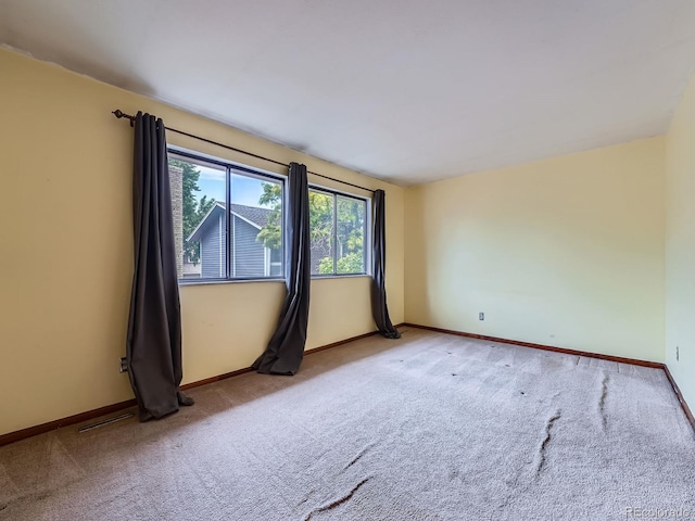 4032 S Atchison Way, Aurora, CO 80014 - carpeted empty room featuring baseboards
