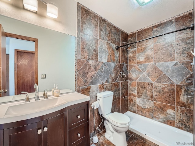 4032 S Atchison Way, Aurora, CO 80014 - bathroom featuring vanity and a tile shower