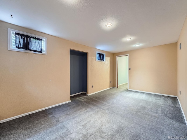 4032 S Atchison Way, Aurora, CO 80014 - spare room featuring dark carpet