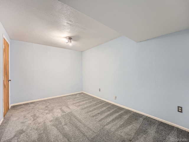 4032 S Atchison Way, Aurora, CO 80014 - carpeted spare room with baseboards and a textured ceiling