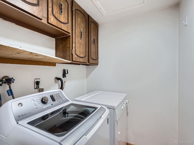 4032 S Atchison Way, Aurora, CO 80014 - laundry room featuring cabinet space and washer and clothes dryer